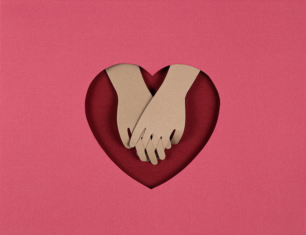 Valentines Day card. Creative paper cut background with Origami Heart and lovers hands. - Fotoğraf, Görsel