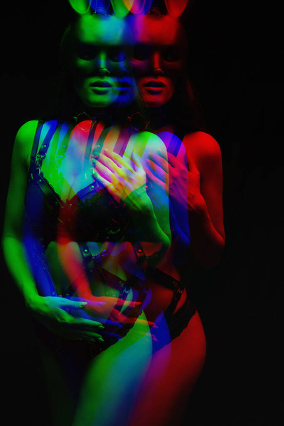 bdsm girl in sexy beautiful black leather underwear and mask. Glitch - Photo, Image