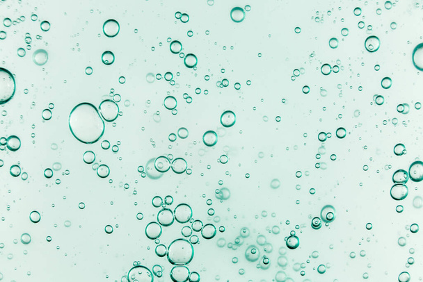 Liquid cream gel, green blue cosmetic texture with bubbles - Foto, imagen