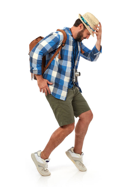 Cheerful man with backpack on white background - Φωτογραφία, εικόνα