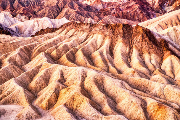 Badlands view from Zabriskie Point in Death Valley National Park at Sunset, California  - Foto, immagini