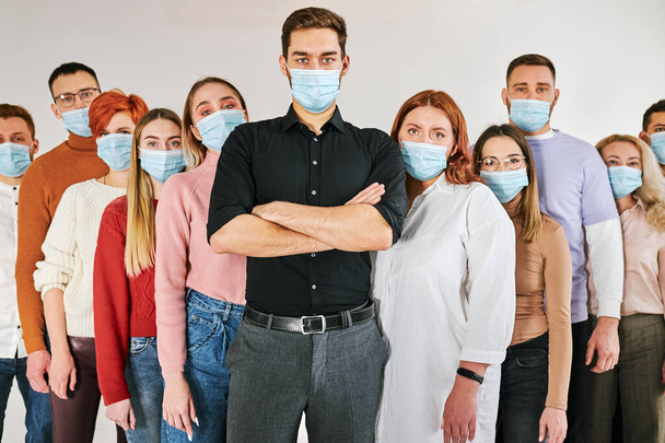 portrait of group of people with in protective masksfrom Coronavirus infections, Covid-19 - Photo, image
