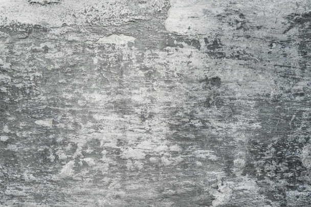 Kalıplaşmış gri duvar. Çimento yüzeyine boya dökülüyor..  - Fotoğraf, Görsel