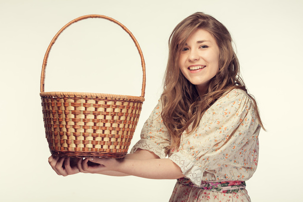 Beautiful girl with basket - 写真・画像