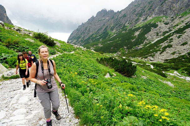                   HIGH TATRA, SLOVAKIA - JULY 20, 2019: Hrebienok, Stary Smokovec, Vysoke Tatry. People hiking to the top of the high Tatra mountains, Slovakia              - Φωτογραφία, εικόνα