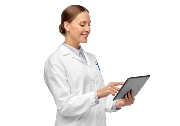 female doctor or scientist with tablet computer - Fotó, kép