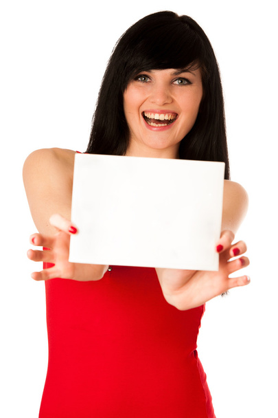 Excited beautiful young woman showing a blank paper isolated - Valokuva, kuva