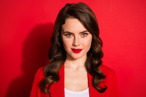 Portrait of magnificent lady look in camera wear suit blazer isolated over red bright color background - Foto, immagini