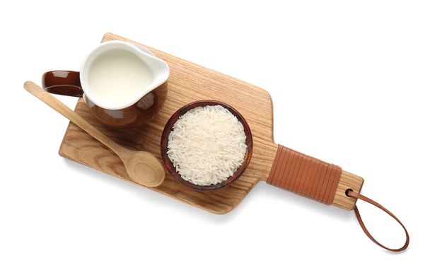 Jug of rice milk on white background - Foto, afbeelding