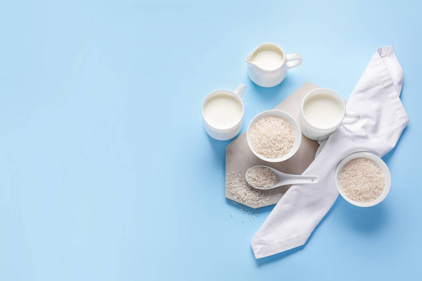 Healthy rice milk on color background - Photo, Image