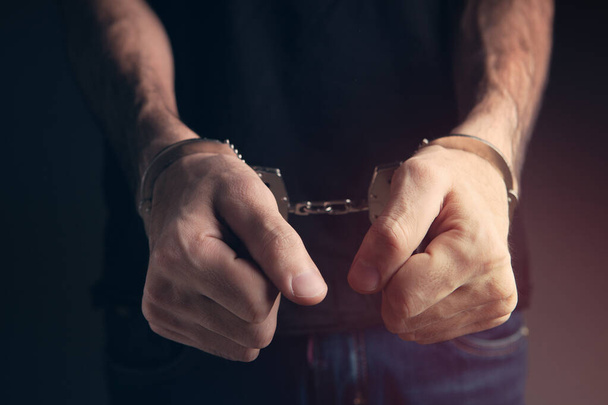 men handcuffed in criminal concept - Фото, изображение