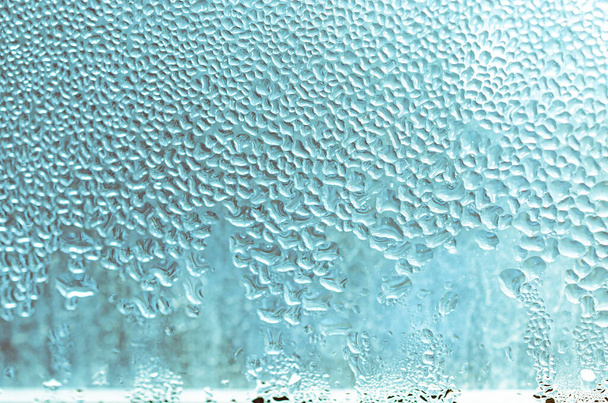 Large drops of condensate on a metal-plastic window. Dew point. Plastic. Ecology - Photo, Image