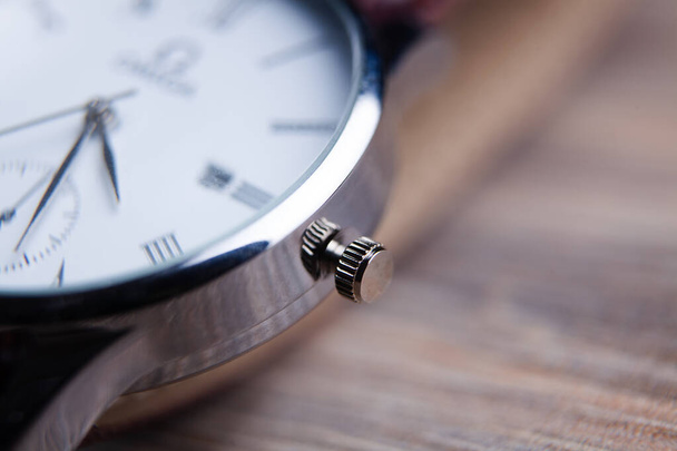 Elegant wrist watch closeup on dark - Φωτογραφία, εικόνα