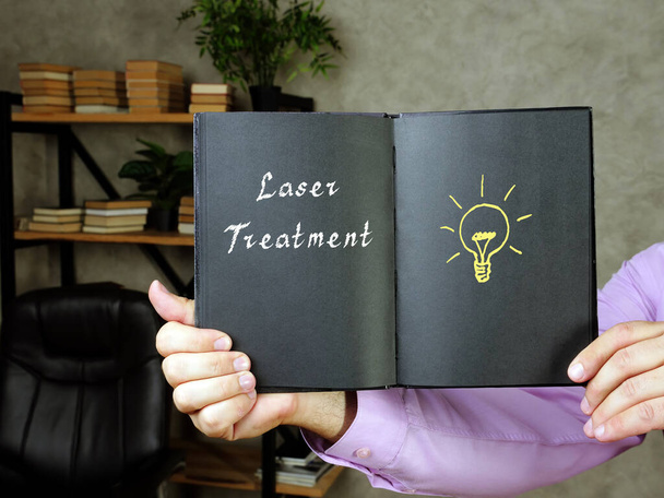 Бизнес-концепция означает лазерное лечение со знаком на странице - Фото, изображение