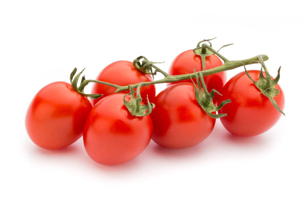 Cherry tomatoes. Three cherry tomatoes on a white background. - 写真・画像