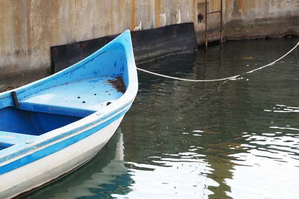 wooden boat tied to the pier close-up - Photo, Image