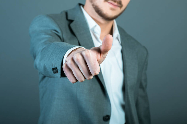 businessman hand okay sign on grey backgroun - Фото, зображення