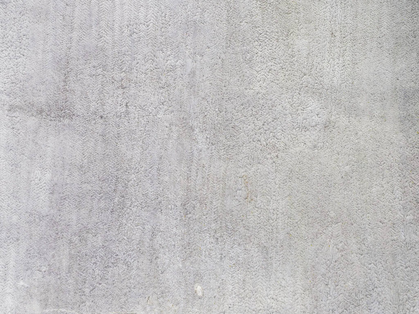 Фрагмент серой стены с текстурированной декоративной штукатуркой. Nexture not seamless - Фото, изображение
