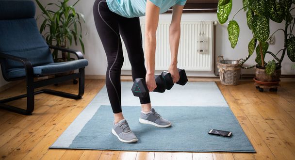 woman doing exercise at home - Photo, Image