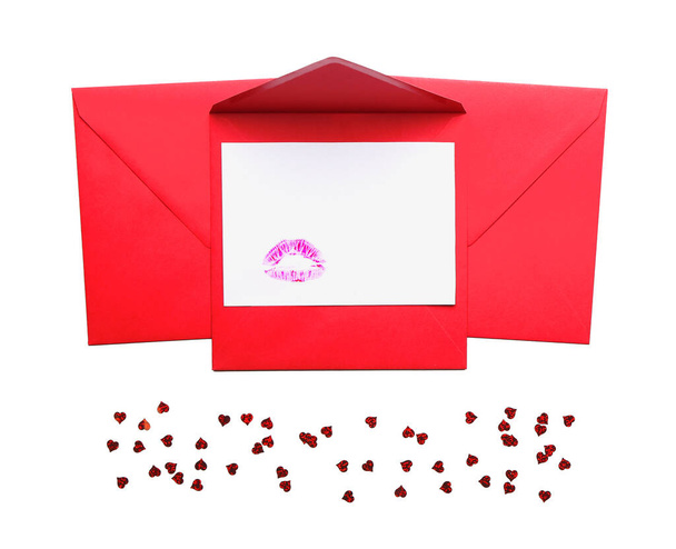 Empty paper sheet with lips print and envelopes on white background - Photo, Image