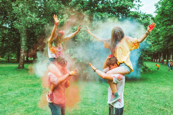 young happy friends at holi fest indian traditional holiday - Photo, Image