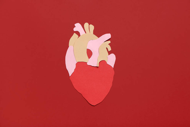 Paper heart on color background - Foto, Imagem