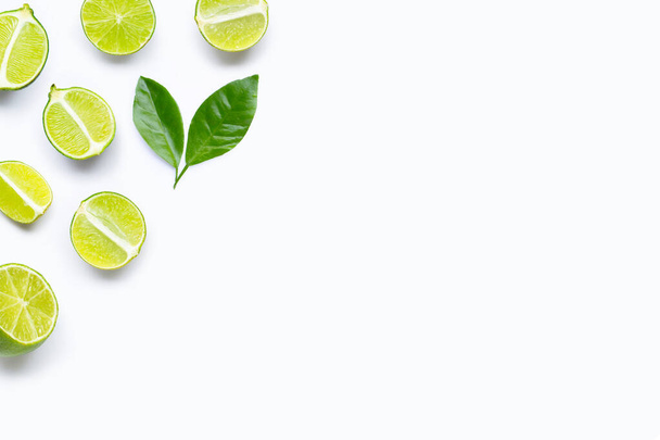 Limes with leaves isolated on white background. - Foto, immagini