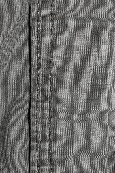 Detailní záběr šedé tkaniny se stehy - Fotografie, Obrázek