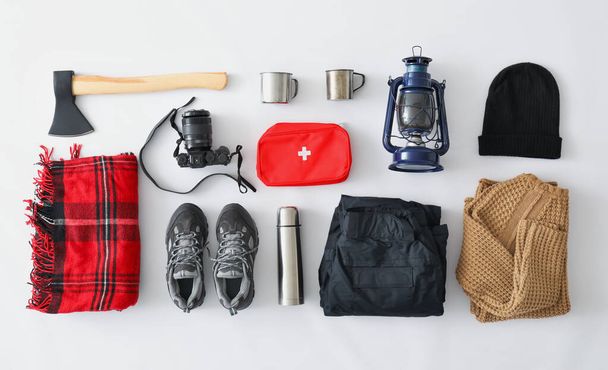 Equipment for hiking on light background - Photo, Image