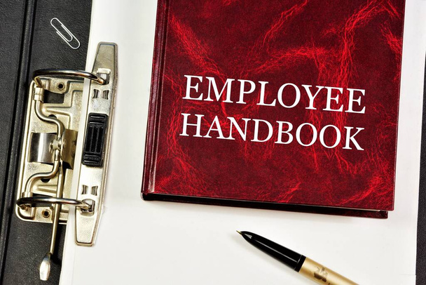 Employee handbook. Determines the human resources practices and labor laws. Explains business goals and desired results. - Photo, Image