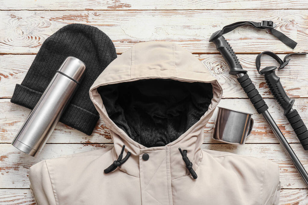 Equipment for hiking on wooden background - Photo, Image