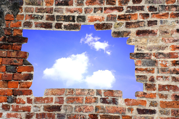 Porous wall to see the blue sky - Photo, Image