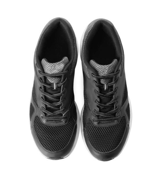 Stylish sport shoes on white background, top view. Trendy footwear - Zdjęcie, obraz