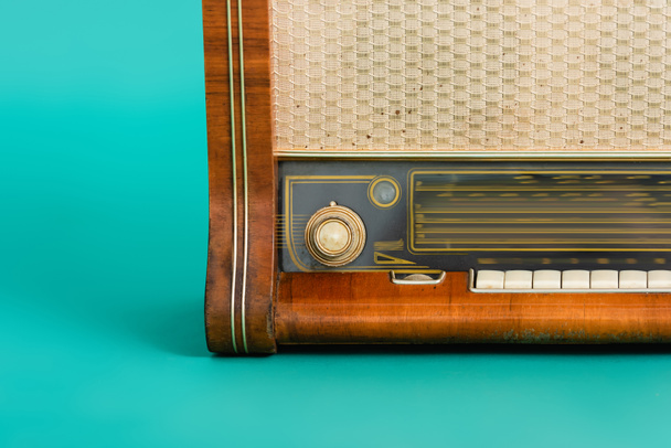 vintage wooden radio on turquoise background - Photo, Image