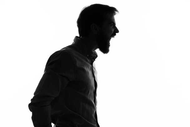 emotional man silhouette shadow profile cropped view - Фото, изображение