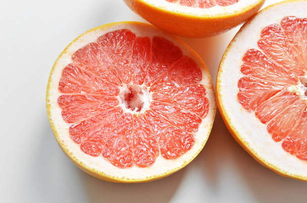 Fresh grapefruit fruits on white background - Photo, image