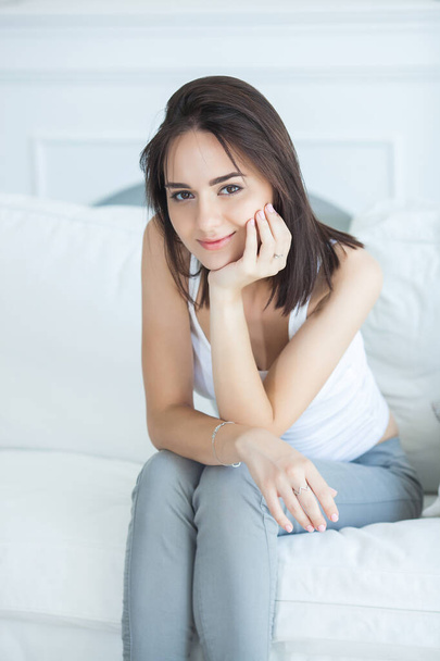Closeup portrait of young attractive woman. Female indoors - Фото, изображение