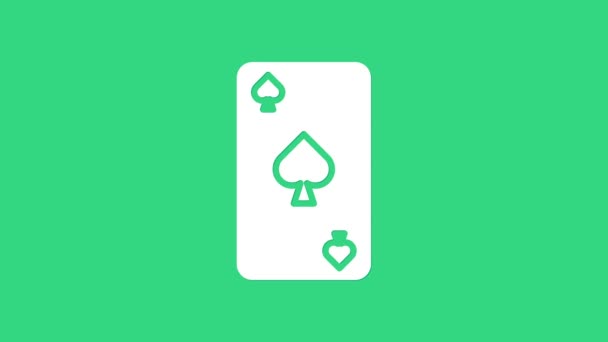 Fehér Játék kártya pikk szimbólum ikon elszigetelt zöld alapon. Kaszinó. 4K Videó mozgás grafikus animáció - Felvétel, videó