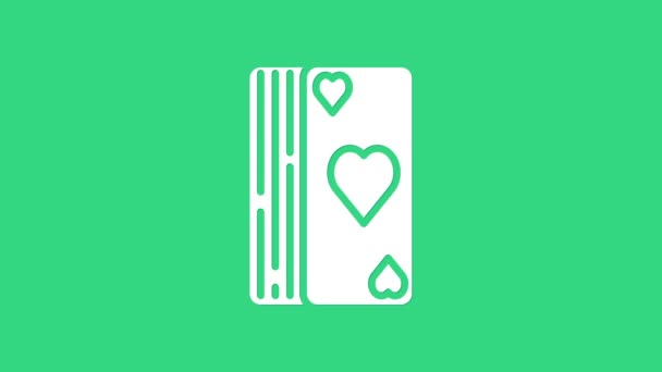 Fehér pakli kártya ikon elszigetelt zöld alapon. Kaszinó. 4K Videó mozgás grafikus animáció - Felvétel, videó