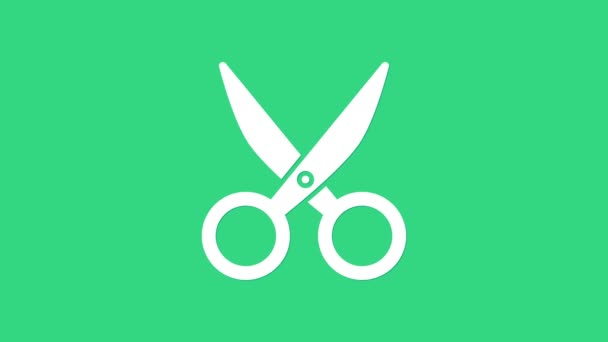 Ікона білих ножиць ізольована на зеленому тлі. Вирізання знака інструмент. 4K Відеографічна анімація - Кадри, відео