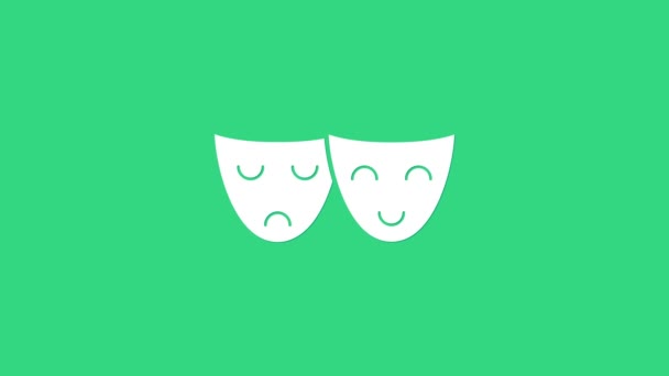 Bílá Komedie a tragédie divadelní masky ikona izolované na zeleném pozadí. Grafická animace pohybu videa 4K - Záběry, video