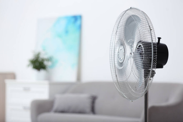 Modern electric fan in room. Space for text - Photo, Image