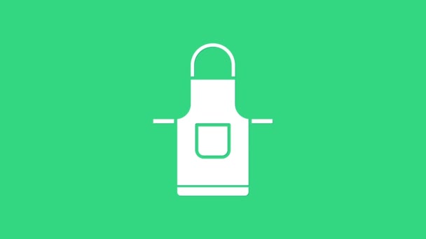 Fehér Konyha kötény ikon elszigetelt zöld alapon. Séf egyenruha a főzéshez. 4K Videó mozgás grafikus animáció - Felvétel, videó