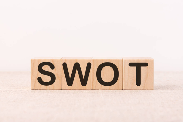 SWOT word made with building blocks on a light background - Foto, Imagen