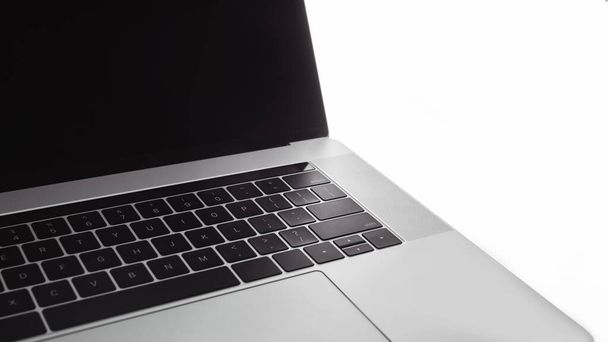 close up. modern laptop with a white hull . - Foto, Bild