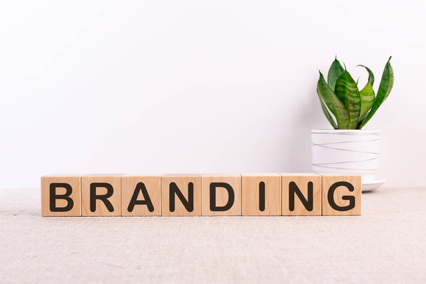 BRANDING word made with building blocks on a light background - Photo, Image