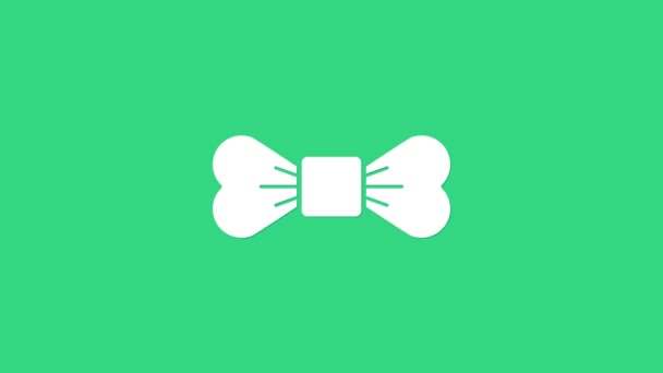 Fehér csokornyakkendő ikon elszigetelt zöld alapon. 4K Videó mozgás grafikus animáció - Felvétel, videó