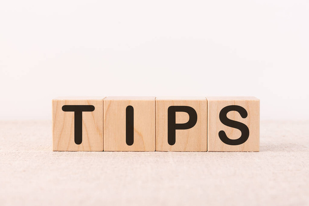 TIPS word made with building blocks on a light background - Photo, Image