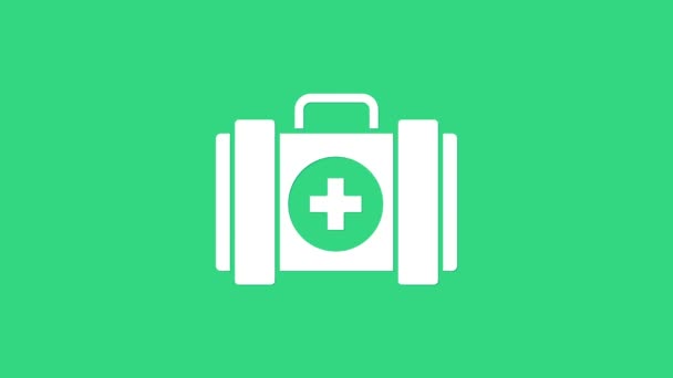 White Pet first aid kit icon isolated on green background. Dog or cat paw print. Clinic box. 4K Video motion graphic animation - Footage, Video