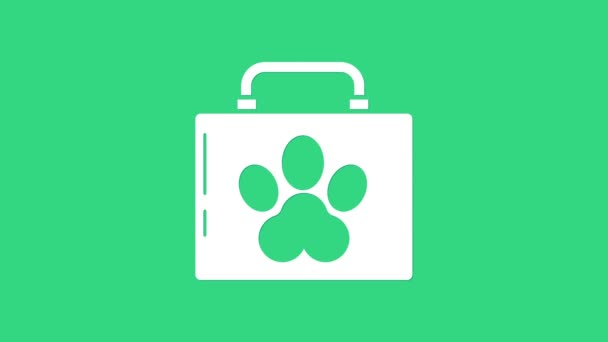 White Pet first aid kit icon isolated on green background. Dog or cat paw print. Clinic box. 4K Video motion graphic animation - Footage, Video